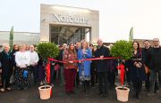 Joanne Hawkins-McDowell, Caroline Notcutt and CEO, Nick Burrows cut the ribbon.